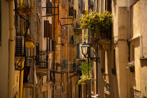 Balcony in a street in Tarragona in summer © Patrick Forian